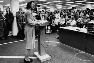 Katherine Graham speaking to newsroom employees during pressmen's strike